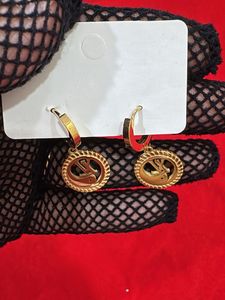 Gold Tone Hoop Earrings with Crystal Accent