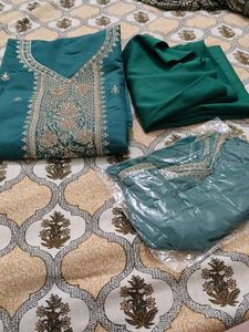 Embroidered Teal suit fabric