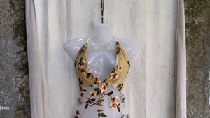 69. Floral Embroidered Sheer Halter Top