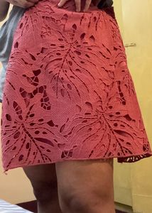 peach pink short skirt