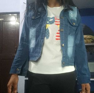 Stylish Blue Denim Jacket with white top and beige