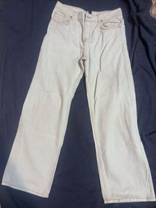 H&M Divided jeans in a "dirty white" or cream colo