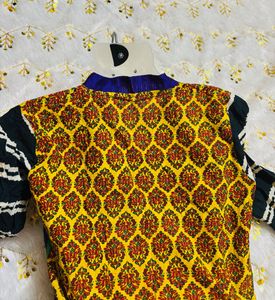Vibrant Yellow Kurta Set with Striped Sleeves