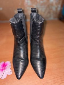 Chic Black Embossed Heeled Boots