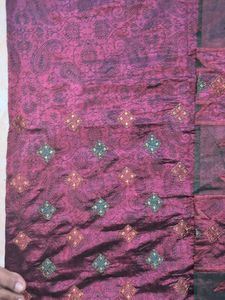 Elegant Purple Saree with Intricate Patterns