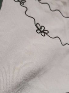 Chic Pink Top with Floral Embroidery