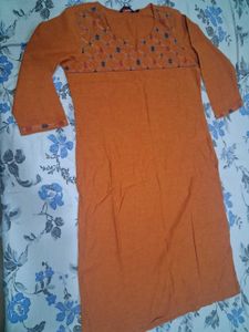 Elegant Rust Orange Kurta with Subtle Embroidery