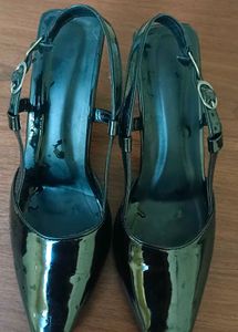 Black pointed heels with adjustable band