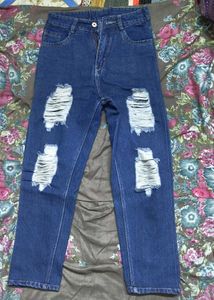 Ripped Blue Denim Jeans