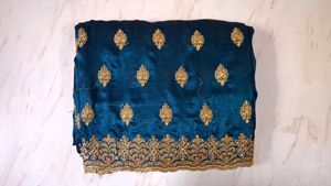 Elegant Teal Saree with Gold Embroidery