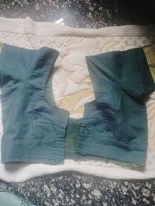 Elegant Teal Blouse with Gold Trim