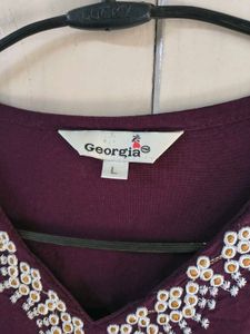 burgundry short kurti with minor flaw
