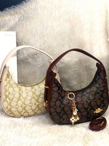 Buy 1 Get ONE  Free Coach moon with charm&amp;carry ba