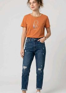 Orange Graphic T-Shirt with Ripped Jeans