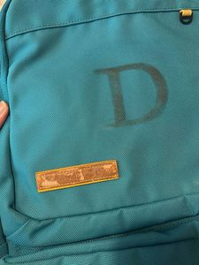 Teal Backpack with D Logo