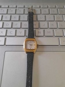 Vintage Gold Tone Watch with Black Leather Strap