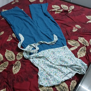 Miss Chase, white-dusky blue floral laced jumpsuits with back chain and sized large
