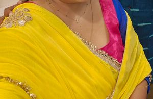 Vibrant Yellow Saree with rani colour blouse