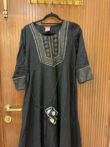 Elegant Black Kurta with Intricate Neckline