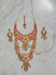 16.Stunning Red and Gold Bridal Jewellery Set