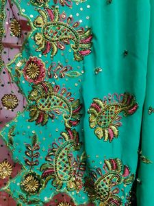 Stunning Embellished Teal Saree