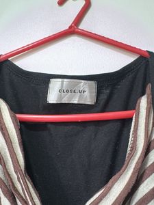 Chic Striped Top with Black Cardigan