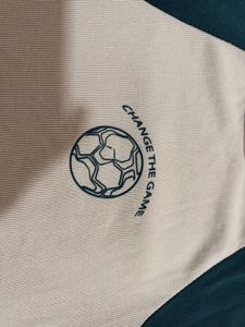 Beige T-Shirt with Soccer Graphic