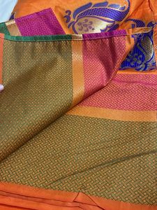 Vibrant Orange Saree with Paisley Border