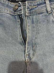 Light Wash Denim Jeans with Embroidered Detail
