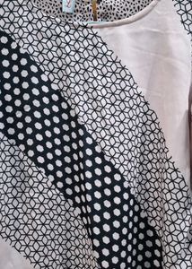 The "Artistic Chic" Mixed-Print Blouse