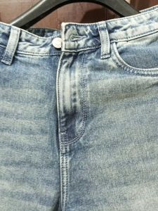 Distressed Blue Denim Jeans