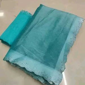 Elegant Teal Saree suitable for parties..