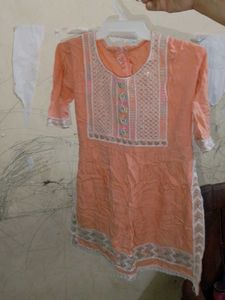 Peach Kurti with Intricate Embellishments