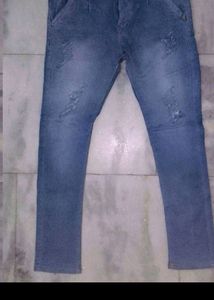 Distressed Blue Denim Jeans