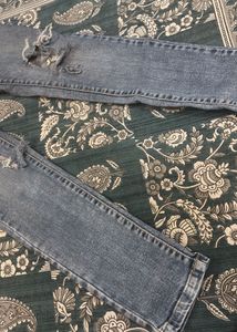 Distressed Blue Denim Jeans