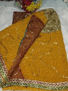 Embellished Brown Net Saree with blouse