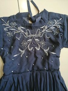 Embroidered Peplum Top