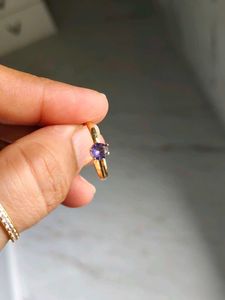 Elegant Gold Ring with Purple Stone