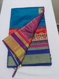 Vibrant Teal Saree with Colorful Border