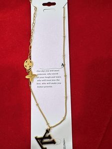 Gold Tone Letter Pendant Necklace