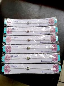 Silver Polish Designer Rakhi ( 6 Pec)