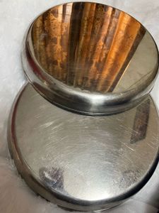 2 heavy steel dinner plates