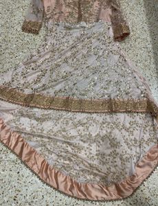 Stunning Peach &amp; Gold Embellished Lehenga Choli