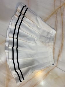 White Pleated Mini Skirt with Black Stripes