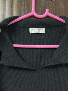 Chic Black Ribbed Bell Sleeve Top