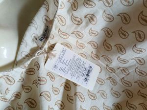 Elegant Off-White Printed Cotton Kurti