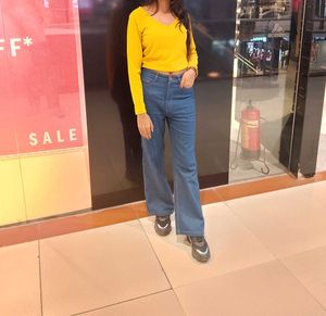 top with jeans both for women