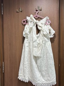 Chic White Lace Mini Dress. brand is sotbella