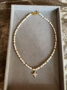 Elegant Pearl Necklace with Diamond Pendant