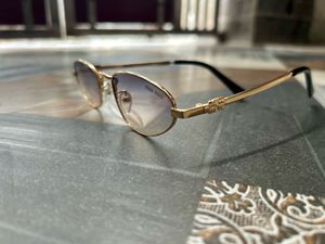MiuMiu Style Gold Frame Sunglasses